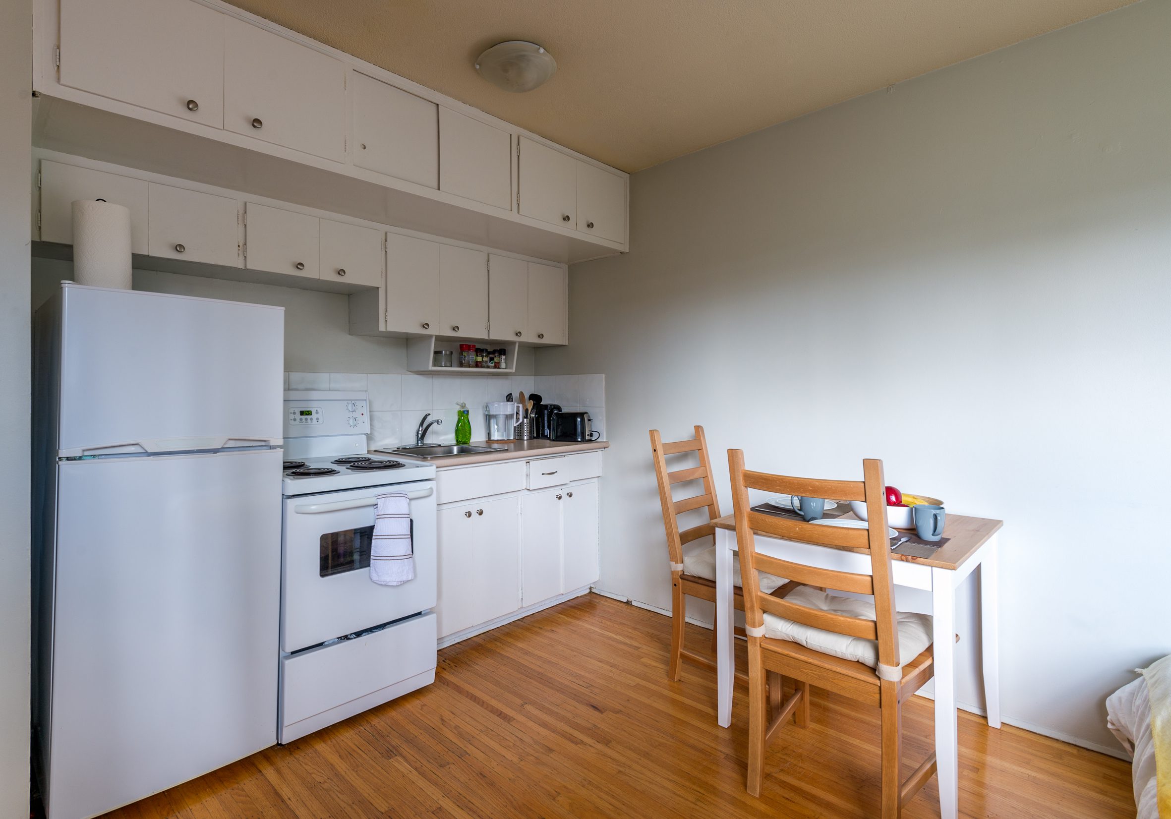Cozy kitchen with a small dinner table. Interior design.